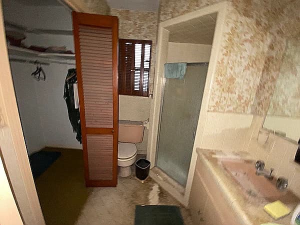 Before picture 6 - Primary Bath view showing small shower and old sink