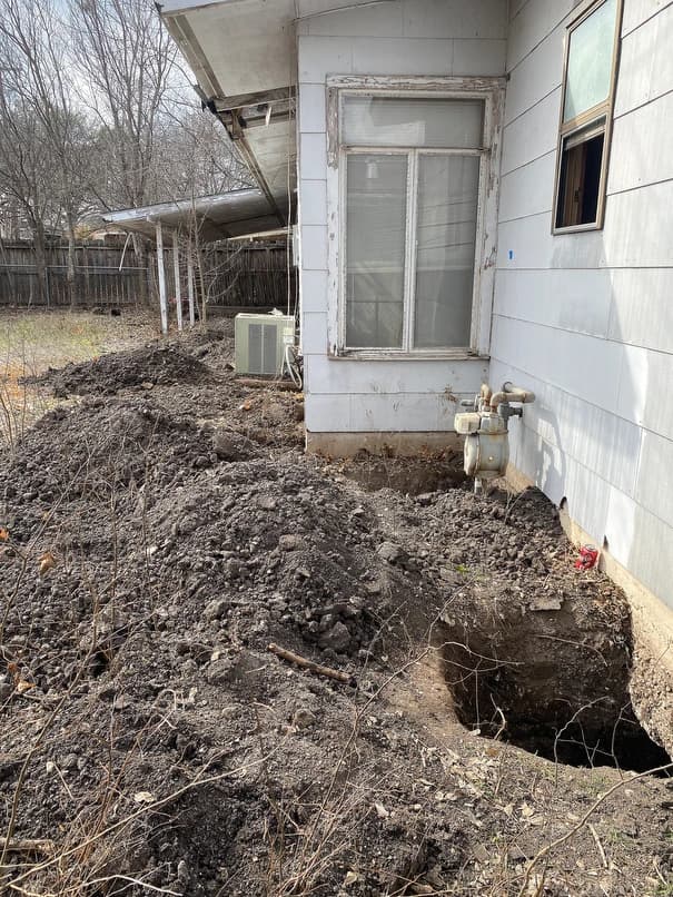 Prep work to lift back of the house for foundation leveling